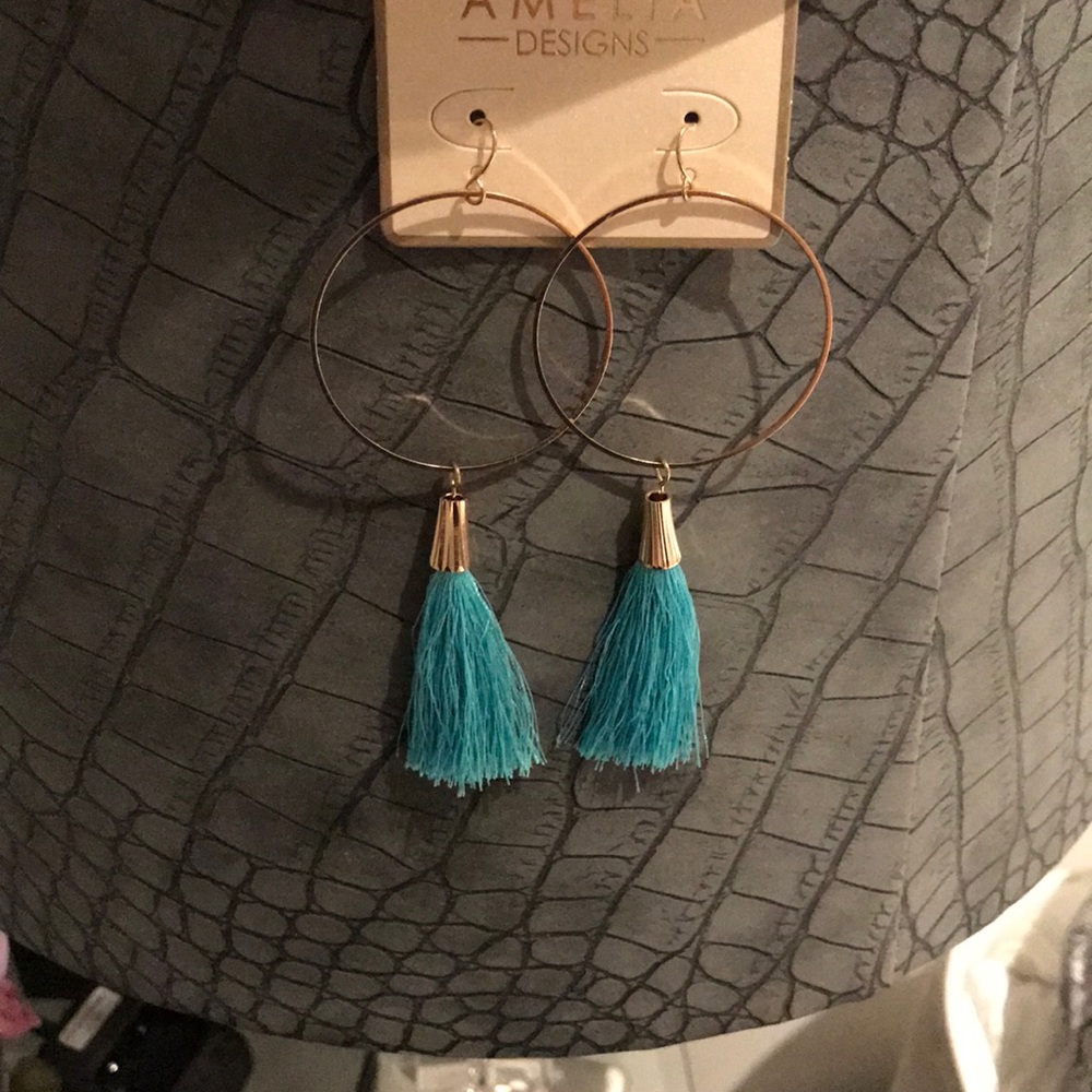 Gold and turquoise large circle tassel earrings.